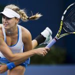 Bouchard of Canada serves to Kleybanova of Russia at the Rogers Cup tennis tournament in Toronto