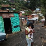 VENEZUELA-ELEC BARRIOS DIVIDIDOS