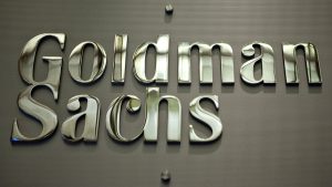 A Goldman Sachs Group Inc. logo hangs on the floor of the New York Stock Exchange in New York, U.S., on Wednesday, May 19, 2010. Goldman Sachs Group Inc. racked up trading profits for itself every day last quarter. Clients who followed the firmÕs investment advice fared far worse. Photographer: Daniel Acker/Bloomberg