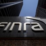 A sign for the Financial Industry Regulatory Authority (FINRA) is seen outside the offices in New York's financial district