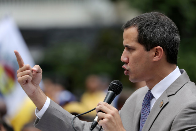 FILE PHOTO: Venezuelan opposition leader Juan Guaido speaks during a gathering with supporters in Caracas