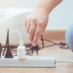 man unplugged plug to save on energy