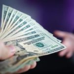 handing-over-money.jpg_656318515