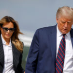 U.S. President Donald Trump and first lady Melania Trump board Air Force One as they depart Washington on campaign travel to participate in the first presidential debate with Democratic presidential nominee Joe Biden in Cleveland, Ohio