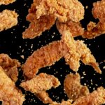 Freeze,Motion,Of,Flying,Pieces,Of,Fried,Chicken,Pieces,On